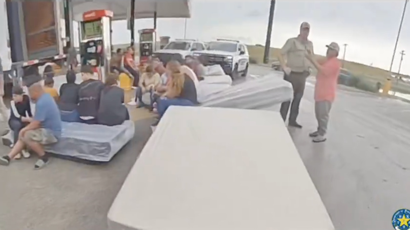 WATCH: Woman Arrested After 25 Illegals Found Crammed in Box Truck
