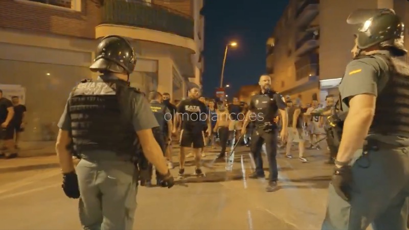 Spanish Clash in The Streets With The Alien Invaders They Invited in