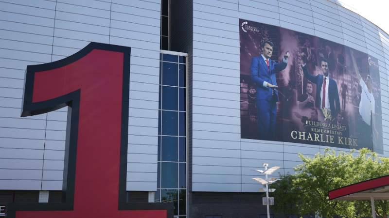 Armed Man at Charlie Kirk Memorial Charged with Impersonation, May Have Been Conducting “Advance Security”