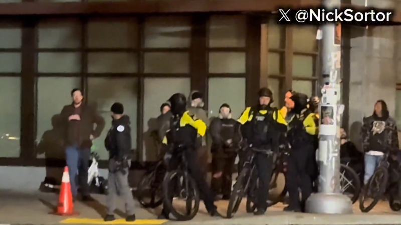 Antifa Thugs Shine Spotlights Into DHS Agents’ Eyes From Behind Shield Wall Of Portland Police Officers