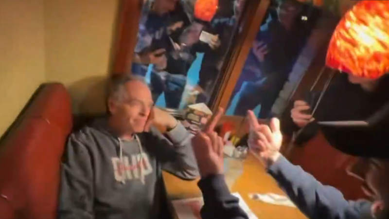 Watch: Entire Town Confronts & Roasts Alleged Child Predator Dining At Restaurant